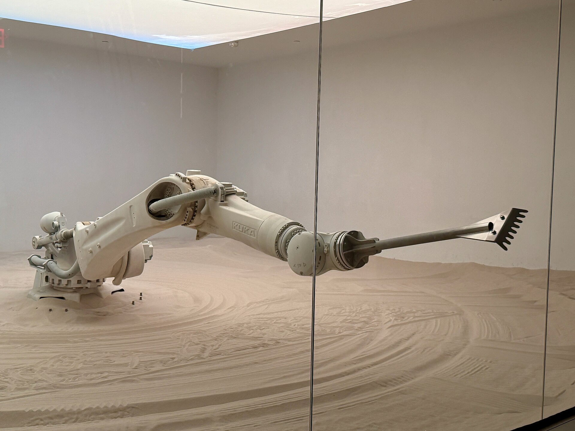 Six-axis industrial robot arm at work